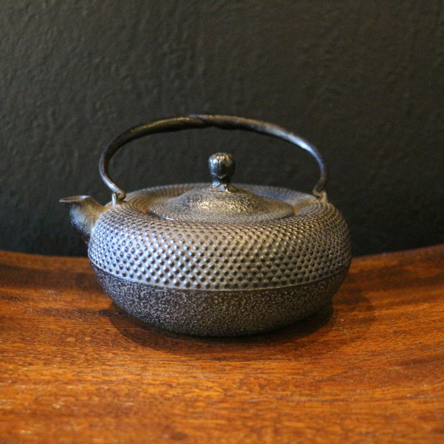 Dotted iron teapot