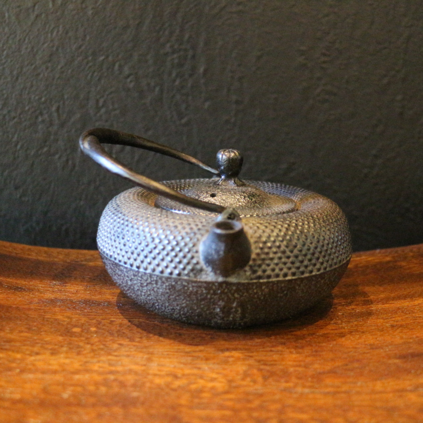 Dotted iron teapot