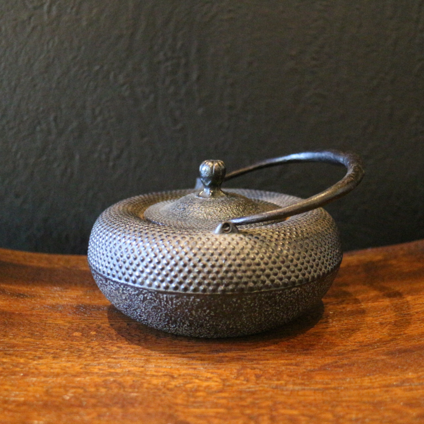 Dotted iron teapot