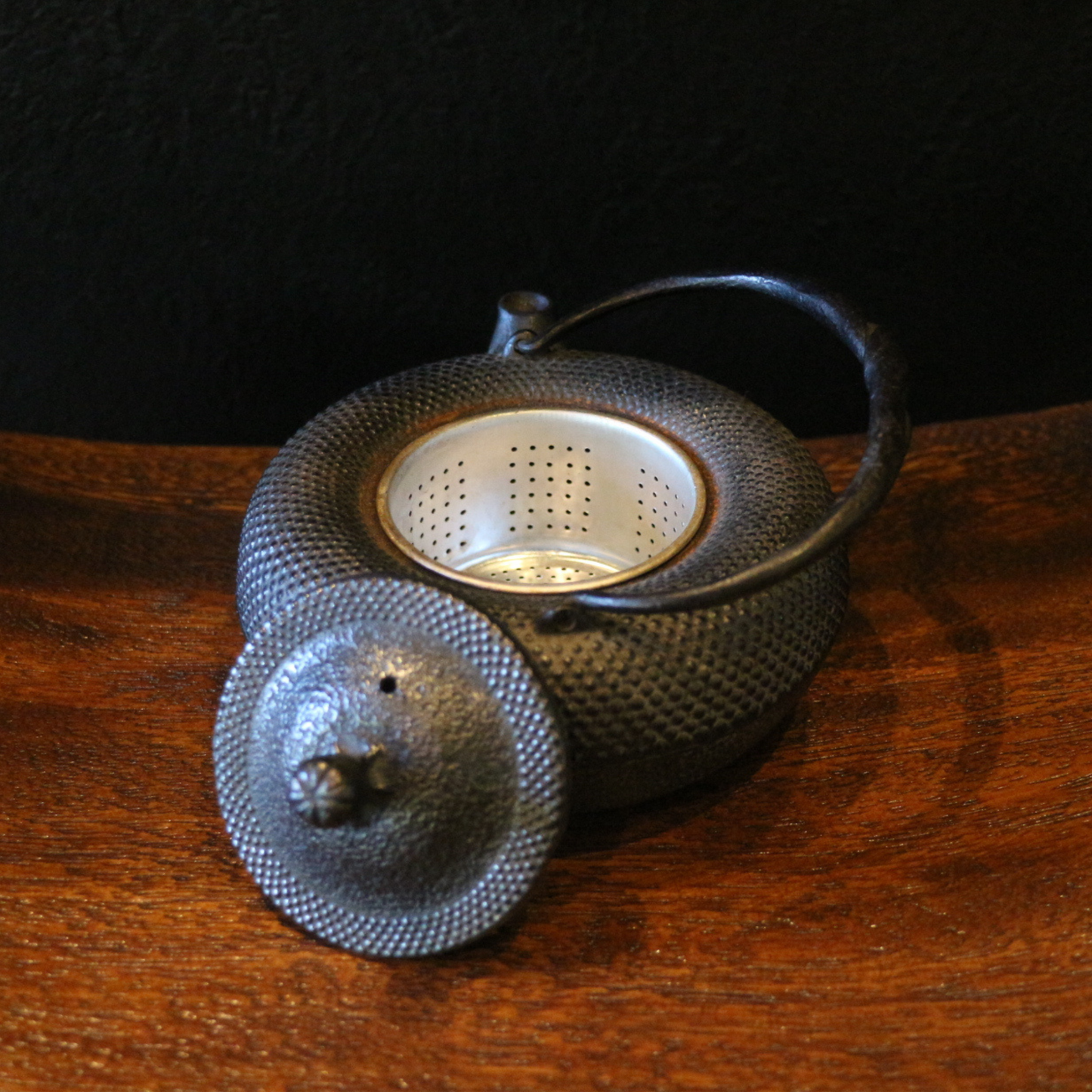 Dotted iron teapot