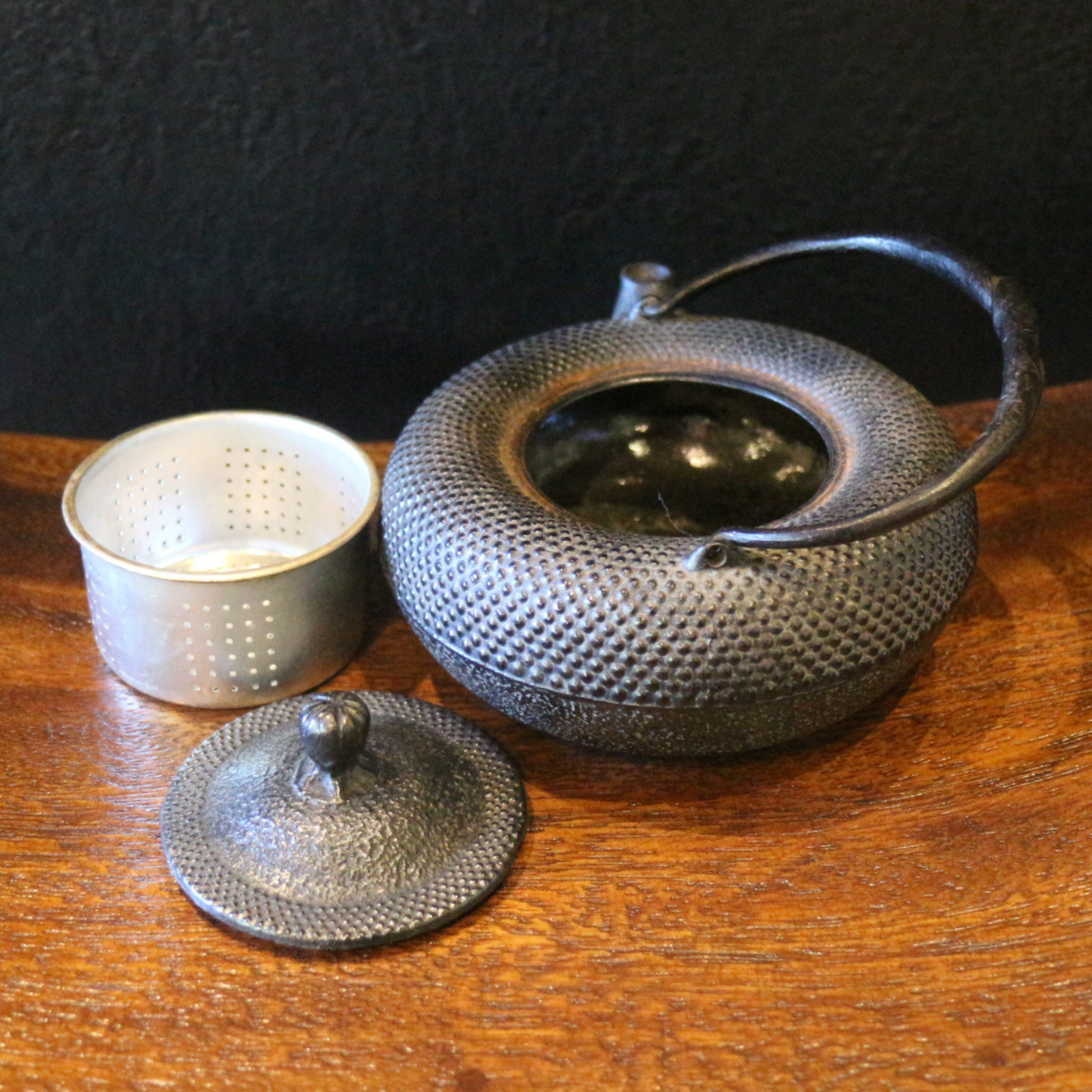Dotted iron teapot